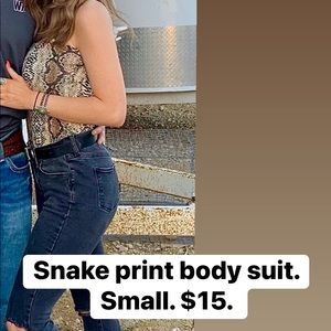 Snake print body suit. Worn twice.